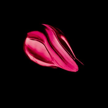 Art abstract, cosmetic product and hand painted design concept - Pink lipstick brush stroke texture isolated on black background