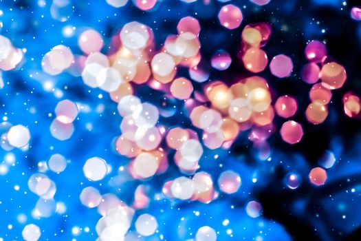 Christmas lights, New Years Eve fireworks and abstract texture concept - Magic sparkling shiny glitter and glowing snow, luxury winter holiday background