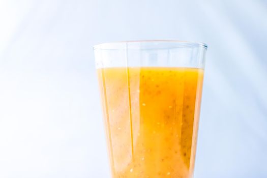 Healthy nutrition, organic drink and fasting cleanse concept - Glass of orange fruit smoothie juice with chia seeds for diet detox, perfect breakfast recipe