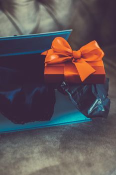 Birthday present, shop sale promotion and autumn decoration concept - Vintage luxury holiday orange gift box with silk ribbon and bow, christmas or valentines day decor