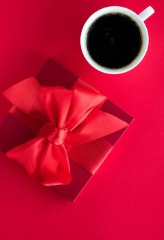 Romantic celebration, lifestyle and birthday present concept - Luxury beauty gift box and coffee on red, flatlay