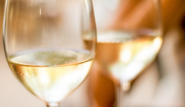 Winery, fine dining and celebration concept - French white wine in a restaurant in Paris, travel experience