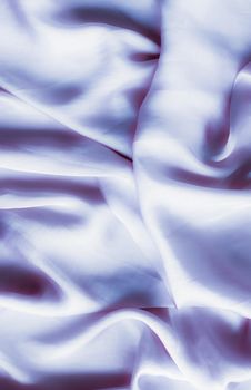 Elegant fabric texture, abstract backdrop and modern pastel colours concept - Purple soft silk waves, flatlay background