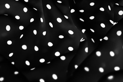 Fashion design, interior decor and classic material concept - Vintage polka dot textile background texture, white dots on black luxury fabric design pattern