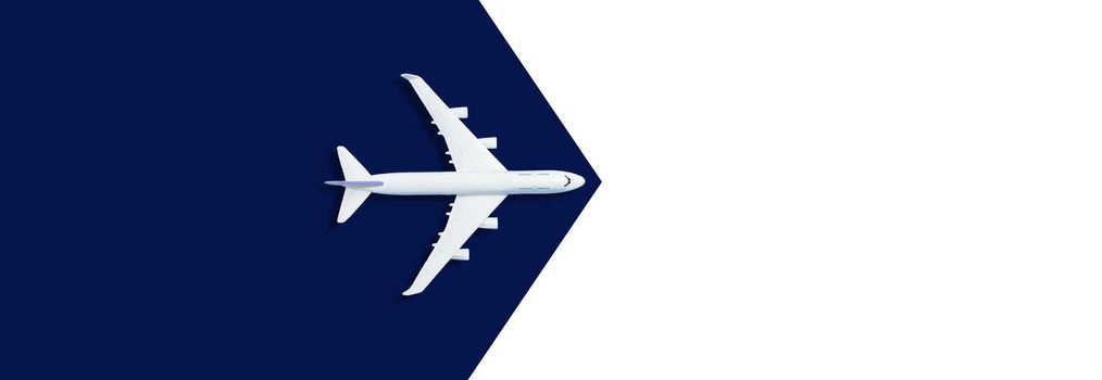 Flat lay design of travel concept with plane on blue runway back. High quality photo