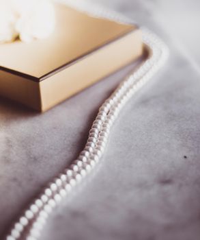 Valentine's day ideas, luxury shopping and holiday inspiration concept - Pearl jewellery in a vintage golden gift box