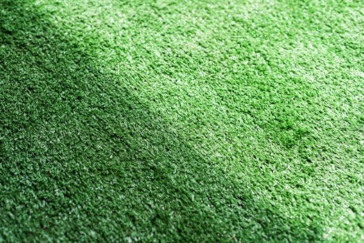 Artificial green grass texture background for soccer field, golf course, lawn background, children playground, outdoor field.