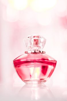 Perfume bottle on glamour background, floral feminine scent, fragrance and eau de parfum as luxury holiday gift, cosmetic and beauty brand present concept