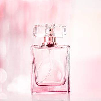 Perfume bottle on glamour background, floral feminine scent, fragrance and eau de parfum as luxury holiday gift, cosmetic and beauty brand present concept