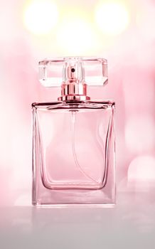 Perfume bottle on glamour background, floral feminine scent, fragrance and eau de parfum as luxury holiday gift, cosmetic and beauty brand present concept