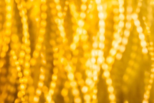 Golden Christmas lights, New Years Eve fireworks and abstract texture concept - Glamorous gold shiny glow and glitter, luxury holiday background