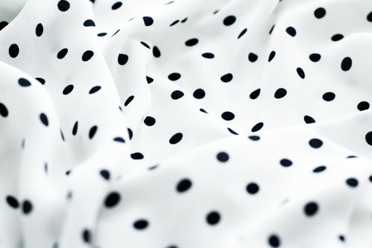 Fashion design, interior decor and vintage material concept - Classic polka dot textile background texture, black dots on white luxury fabric design pattern