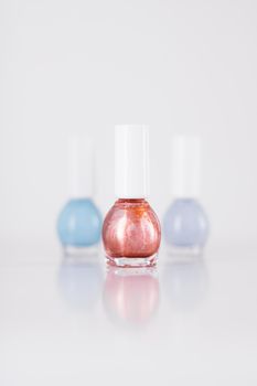 Beauty, make-up and cosmetics concept - Nail polish bottles, manicure and pedicure collection