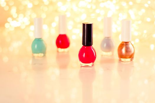 Beauty, make-up and cosmetics concept - Nail polish bottles, manicure and pedicure collection