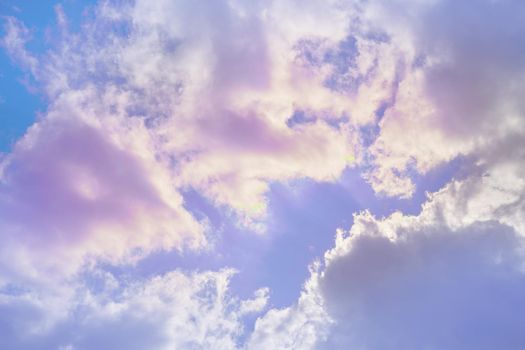 Cloud and sky with a pastel colored background