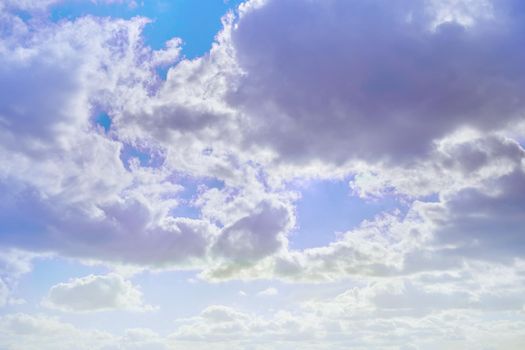 Cloud and sky with a pastel colored background
