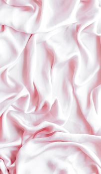 Elegant fabric texture, abstract backdrop and modern pastel colours concept - Pink soft silk waves, flatlay background