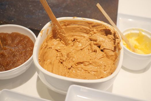 top view of peanut butter in a container