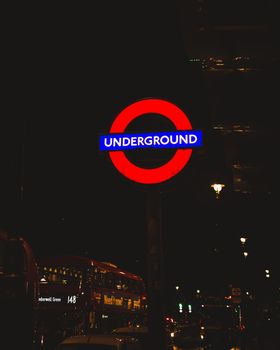 London Underground sign at night. High quality photo