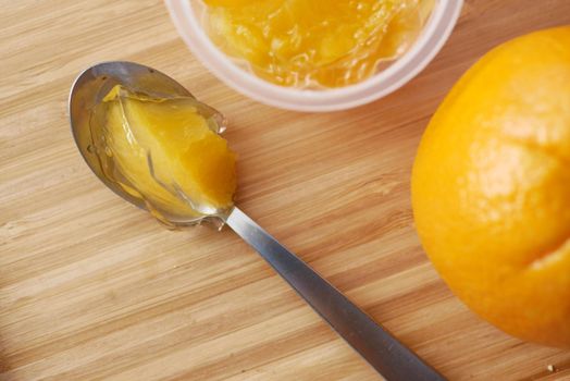 colorful orange flavor jelly on plate on table