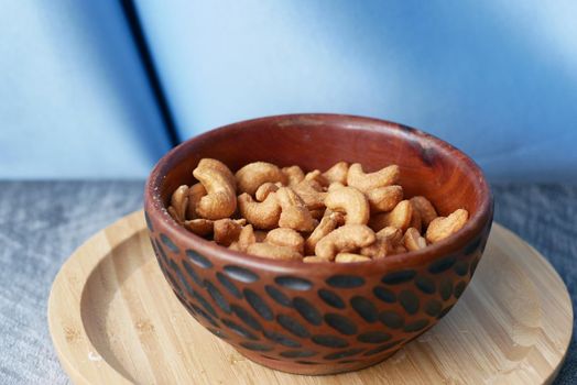 close up of cashew nuts in a bowl on table ,