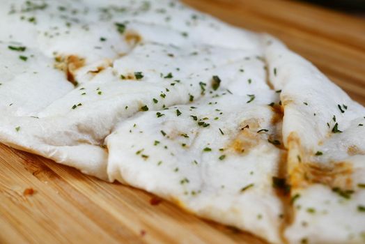 nan bread on a wooden board ,