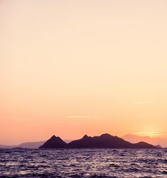 Nature, twilight and vintage beach holiday concept - Summer sunset at the Mediterranean sea coast, seascape and mountain view