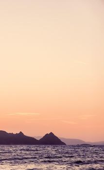 Nature, twilight and vintage beach holiday concept - Summer sunset at the Mediterranean sea coast, seascape and mountain view