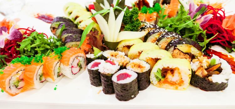 Food, travel and healthy eating concept - Japanese sushi in a restaurant at lunch time, asian cuisine