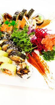 Food, travel and healthy eating concept - Japanese sushi in a restaurant at lunch time, asian cuisine