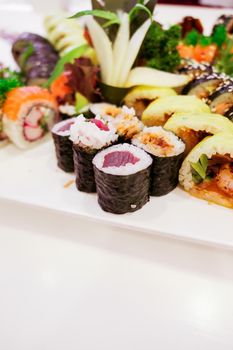 Food, travel and healthy eating concept - Japanese sushi in a restaurant at lunch time, asian cuisine