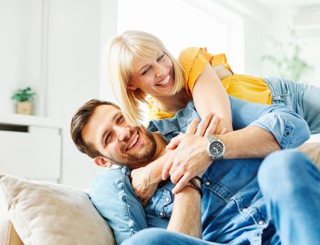 Portrait of a lovely young couple together at home