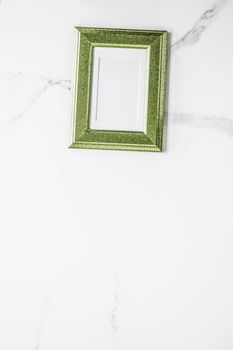 Modern feminine, artwork mock up, luxury design concept. Decorate with chic and style - Green photo frame on marble, flatlay