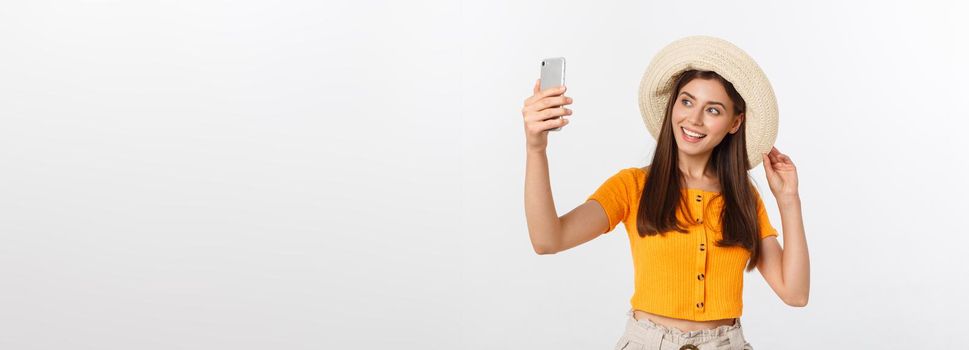 Young Caucasian woman enjoying the selfie with herself isolated on white background summer travel concept