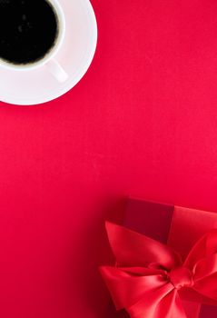 Romantic celebration, lifestyle and birthday present concept - Luxury beauty gift box and coffee on red, flatlay