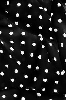 Fashion design, interior decor and classic material concept - Vintage polka dot textile background texture, white dots on black luxury fabric design pattern