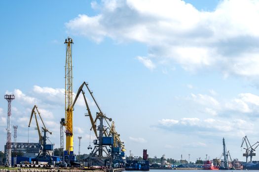 Vyborg, Leningrad region, Russia. - August 27, 2022. View of the commercial port with cargo cranes. Selective focus.