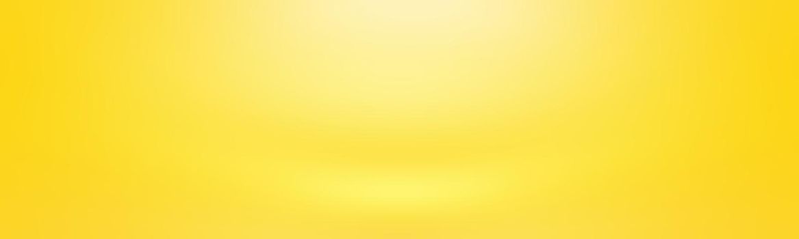 Abstract solid of shining yellow gradient studio wall room background