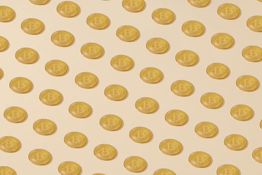 Bitcoin. Isometrically placed golden yellow bitcoin coins on a cream background