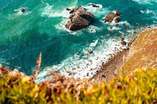 Atlantic ocean view with cliff. View of Atlantic Coast at Portugal, Cabo da Roca. Summer day. Seaside. Coastline. Beautiful landscape