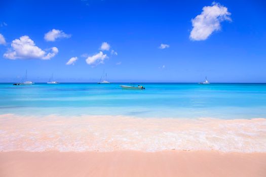 Tropical paradise, idyllic caribbean beach with sailboats and boats, Punta Cana, Dominican Republic