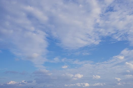 Beautiful white fluffys clouds sky background with blue sky background