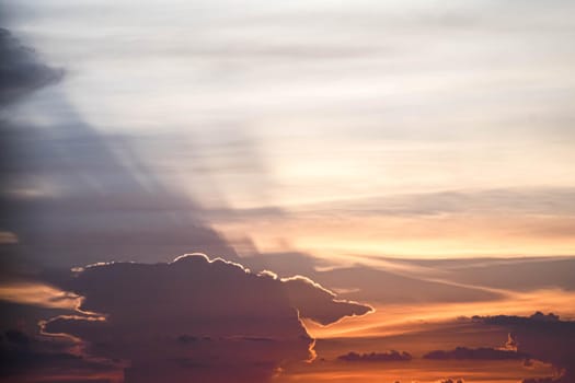 Beautiful sunset sky above clouds orange sunset sky. Beautiful sky. Dramatic red yellow pastel color at sunset.