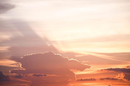 Beautiful sunset sky above clouds orange sunset sky. Beautiful sky. Dramatic red yellow pastel color at sunset.