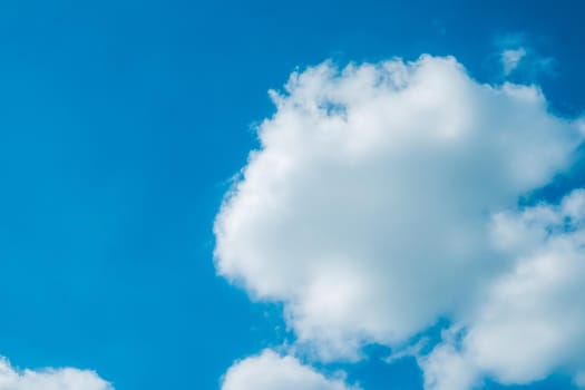 white fluffys clouds sky background with blue sky background for copy space