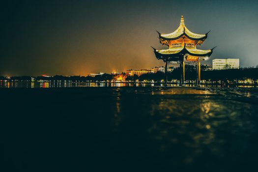 Traditional chinese pavilion style at Lake Xi hu lake lake in Hangzhou. UNESCO World Heritage Site West Lake Cultural Landscape of Hangzhou.