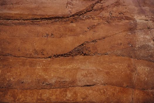 Soil texture layers for natural background. Abstract nature Soil patterned layer of clay soil for the background. Layer of dry soil cracks natural texture and background . Cracked and barren ground,dry soil textured background,form of soil layers,its colour and textures,texture layers of earth for background