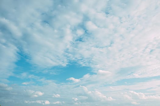 Beautiful white fluffys clouds sky background with blue sky background