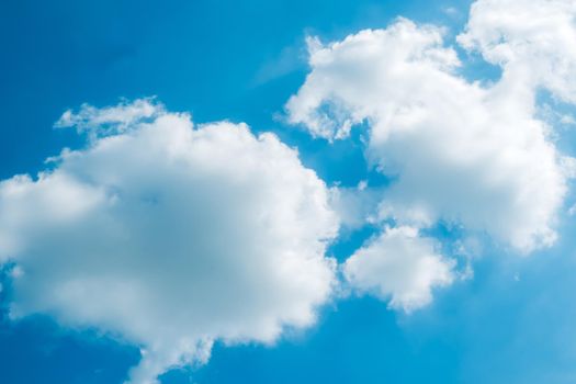 white fluffys clouds sky background with blue sky background for copy space
