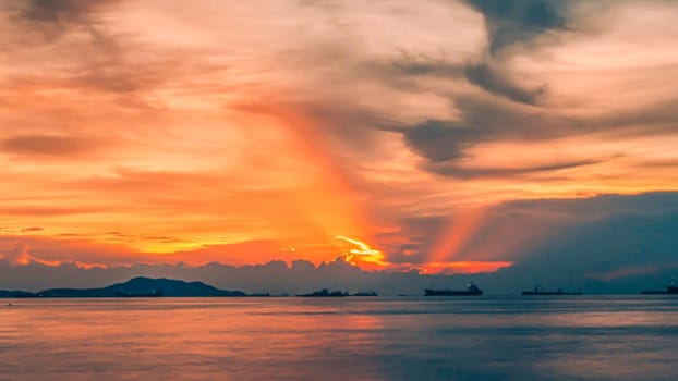 A golden sunrise or sunset over the ocean. Sunset, Sunrise Summer Landscape. Beautiful Nature.
